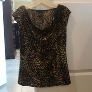 Leopard print, drape neck sleeveless top.